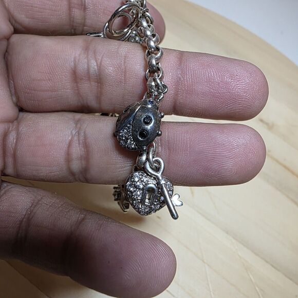 Sterling Silver 925 Rolo Link Charm Bracelet With 8 Charms Measures 7.5 Inches - Picture 6 of 10